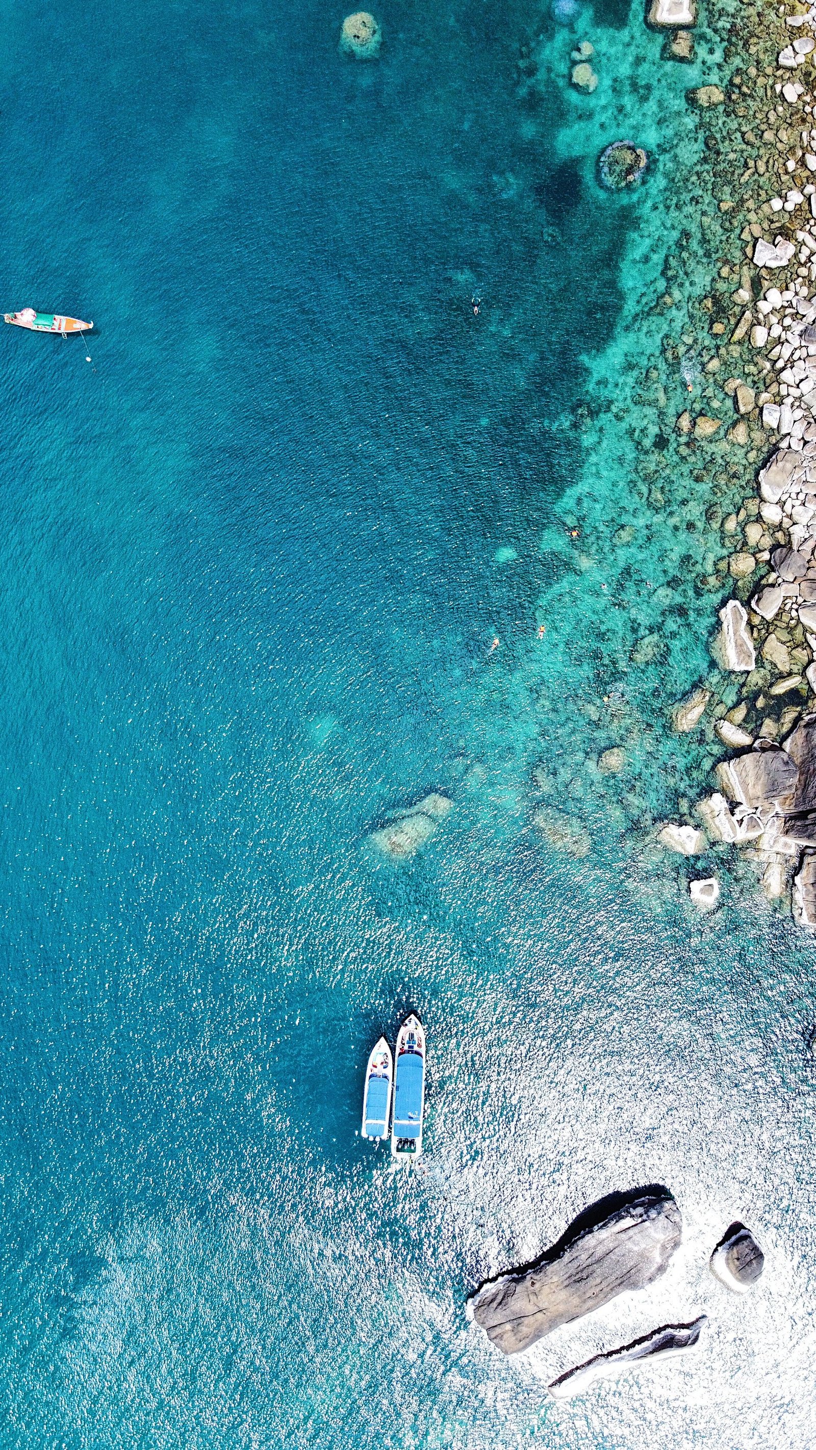 Boats on turquoise water near Koh Samui
